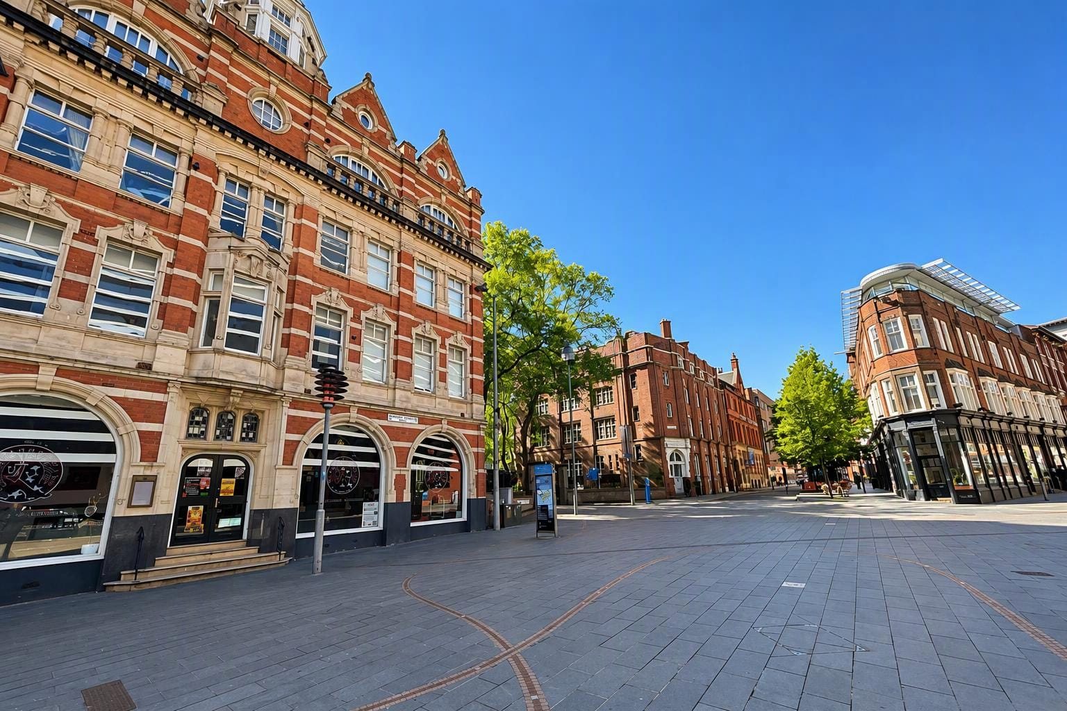 Leicester city centre street with Victorian red-brick buildings